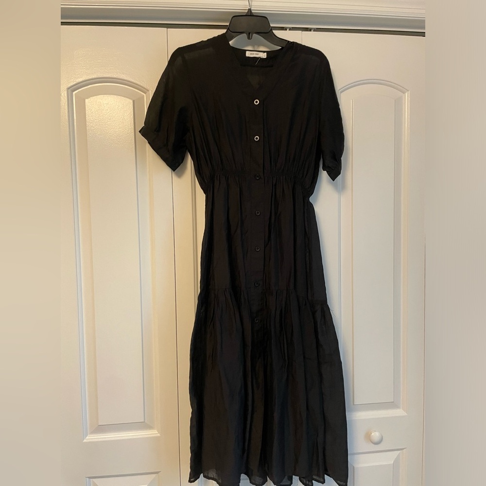 Mod Ref sheer black dress.